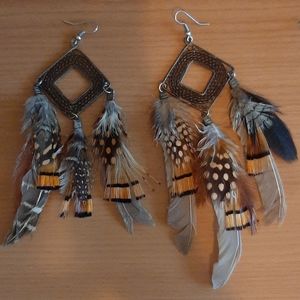 Gold feather earrings